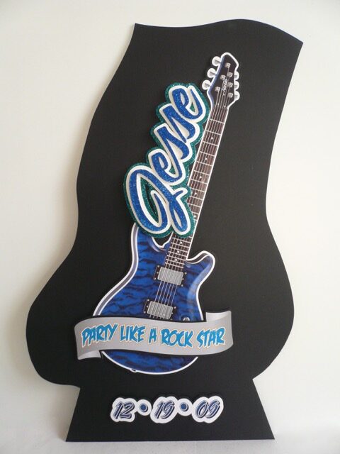 guitar sign in board with cut out name